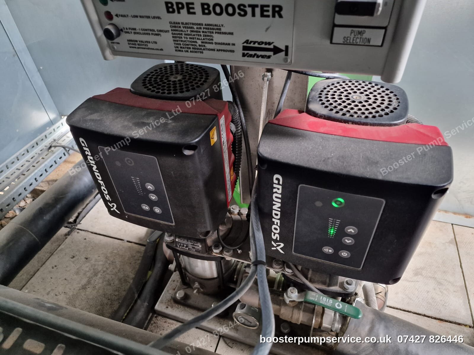 Grundfos twin booster set with stainless manifold — pump commissioning in London.