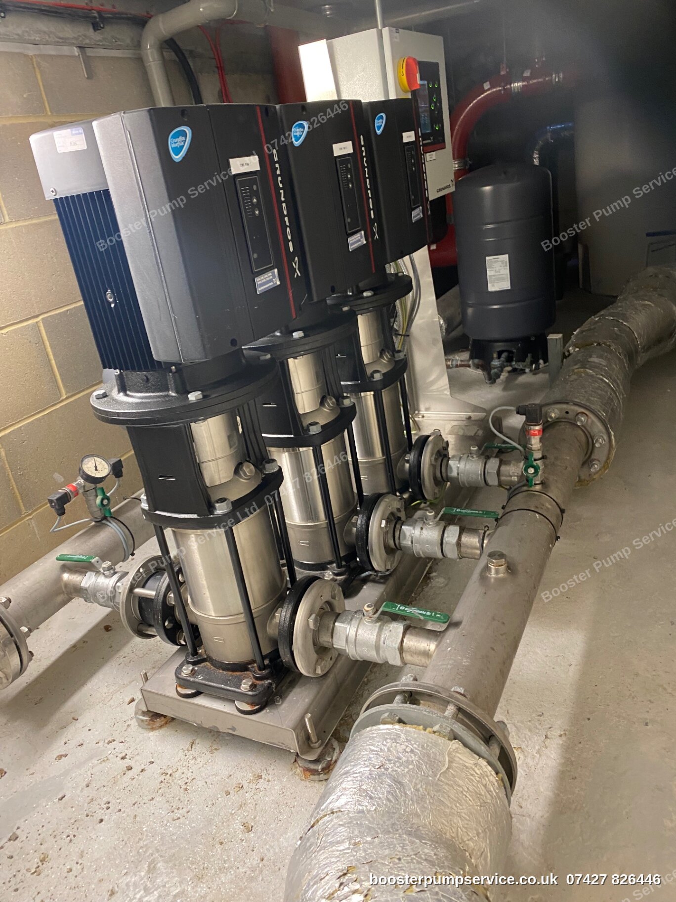 Grundfos CRE vertical multistage pump with integrated variable speed drive — expansion vessel replacement & recharge by our engineers in London.