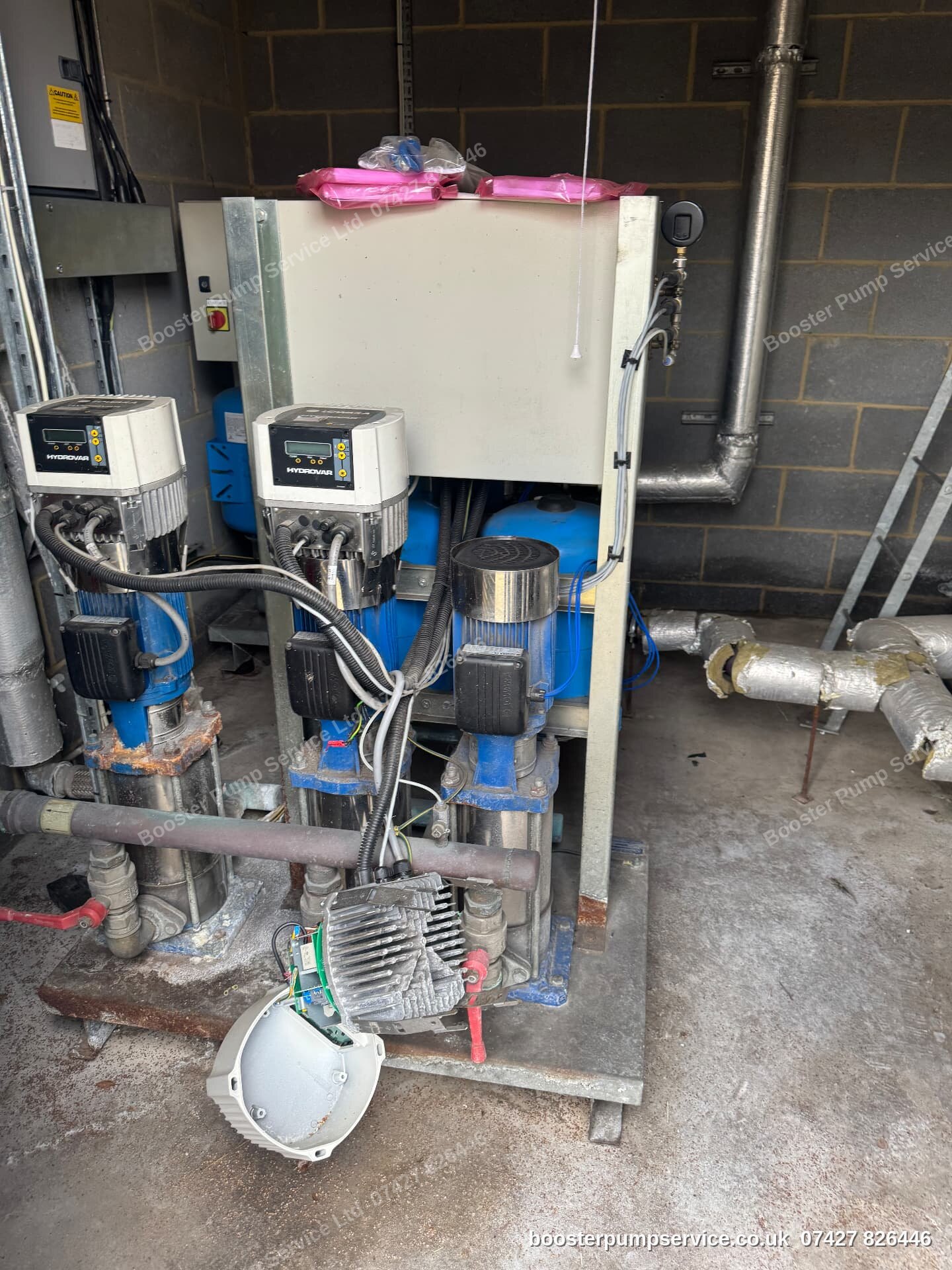 triple vertical multistage booster set with Hydrovar variable speed drives and break tank — expansion vessel replacement & recharge in London.